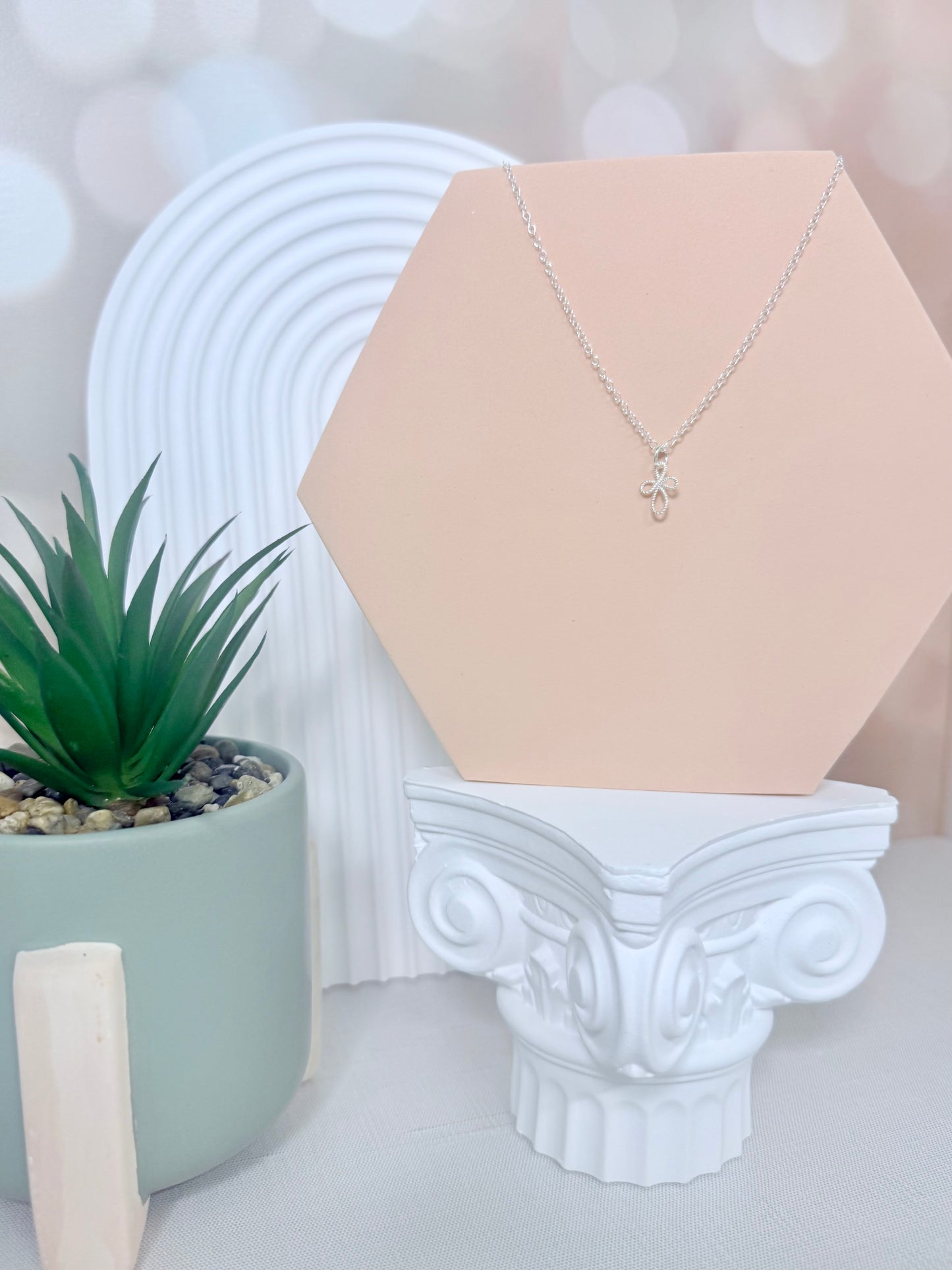 Silver Twisted Cross