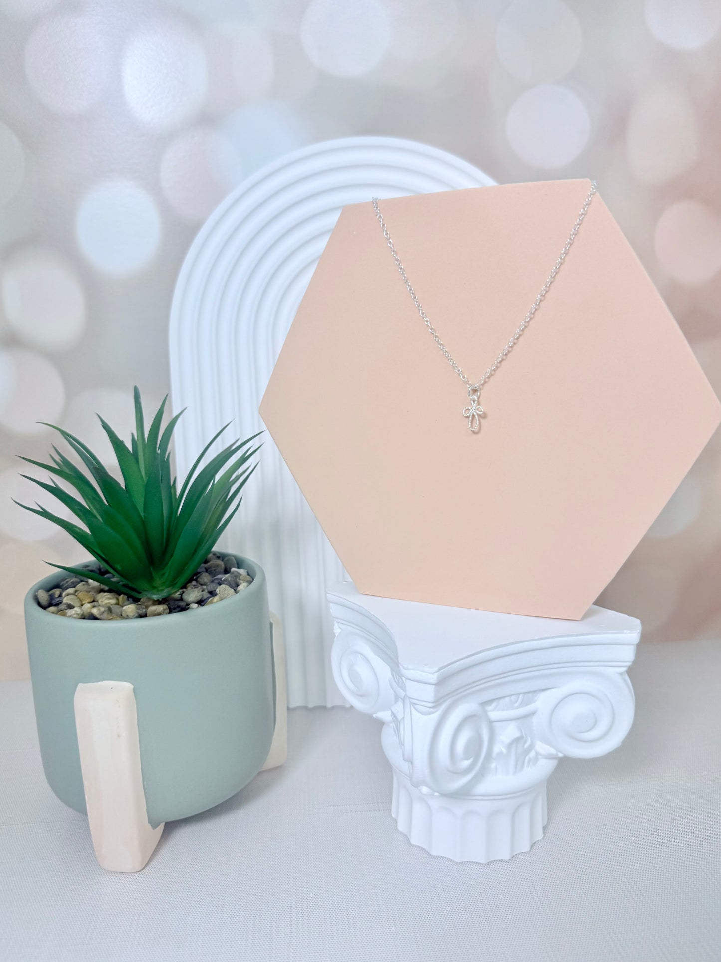 Silver Twisted Cross